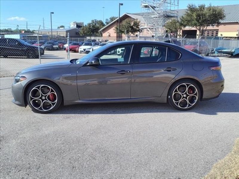 2024 Alfa Romeo Giulia Veloce in a Vesuvio Gray Metallic exterior color and Blackinterior. Northside Imports Houston 281-475-4549 northsideimportshouston.com 