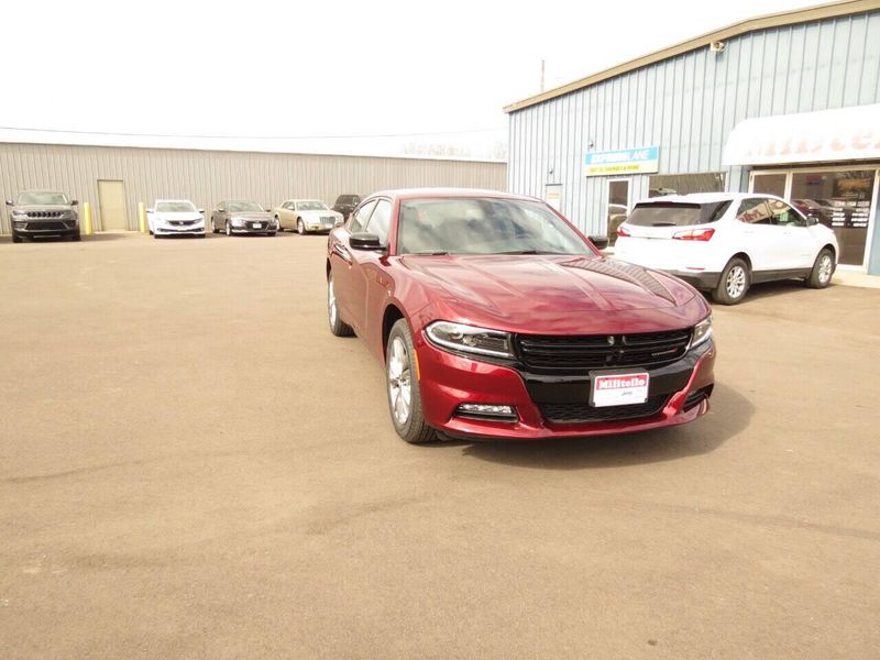 2023 Dodge Charger SXT Awd in a Octane Red exterior color and Blackinterior. Militello Motors ​507-200-4344 militellomotors.net 