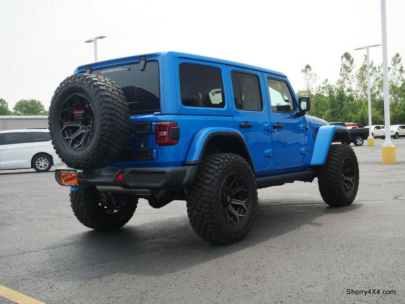 2023 Jeep Wrangler Rubicon 4xe in a Hydro Blue Pearl Coat exterior color and Black/Dark Saddleinterior. Paul Sherry Chrysler Dodge Jeep RAM (937) 749-7061 sherrychrysler.net 