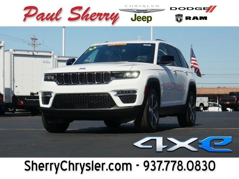 2024 Jeep Grand Cherokee 4xe in a Bright White Clear Coat exterior color and Wicker Beige/Global Blackinterior. Paul Sherry Chrysler Dodge Jeep RAM (937) 749-7061 sherrychrysler.net 