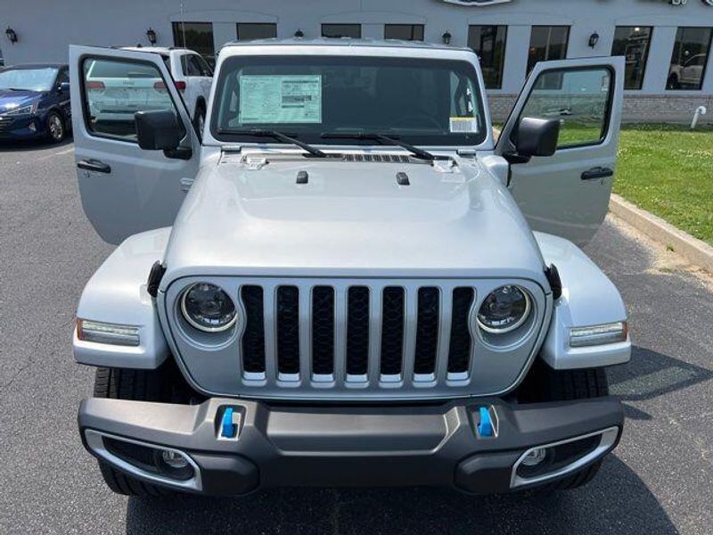 2023 Jeep Wrangler Sahara 4xe in a Silver Zynith Clear Coat exterior color and Blackinterior. Lakeshore CDJR Seaford 302-213-6058 lakeshorecdjr.com 
