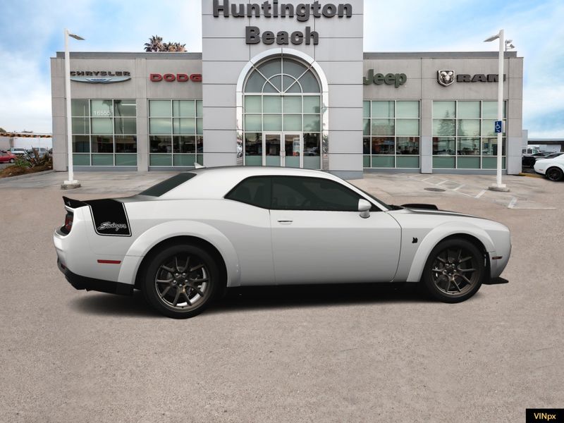2023 Dodge Challenger R/T Scat Pack Widebody Swinger Special Edition in a White Knuckle exterior color and Blackinterior. BEACH BLVD OF CARS beachblvdofcars.com 