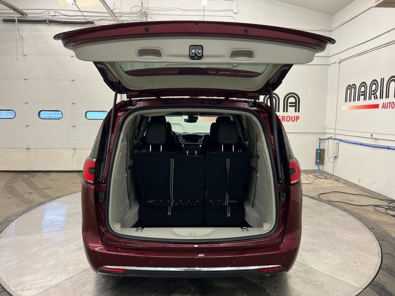 2023 Chrysler Pacifica Plug-in Hybrid Touring L in a Velvet Red Pearl Coat exterior color and Blackinterior. Marina Auto Group (855) 564-8688 marinaautogroup.com 