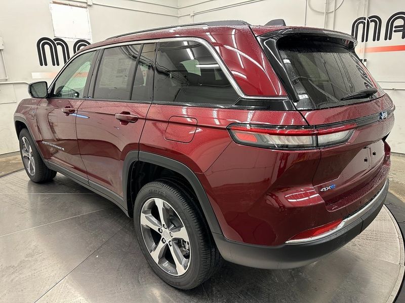 2024 Jeep Grand Cherokee 4xe in a Velvet Red Pearl Coat exterior color and Wicker Beige/Global Blackinterior. Marina Auto Group (855) 564-8688 marinaautogroup.com 