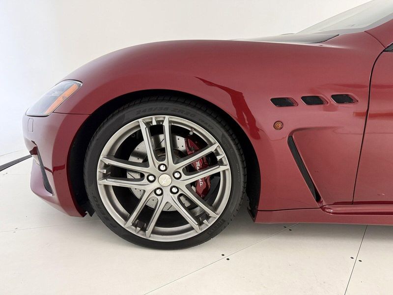 2018 Maserati GranTurismo MC in a Rosso Trionfale Metallic exterior color and Bianco Pregiatointerior. Karma Newport Beach (844) 527-6262 karmanb.com 