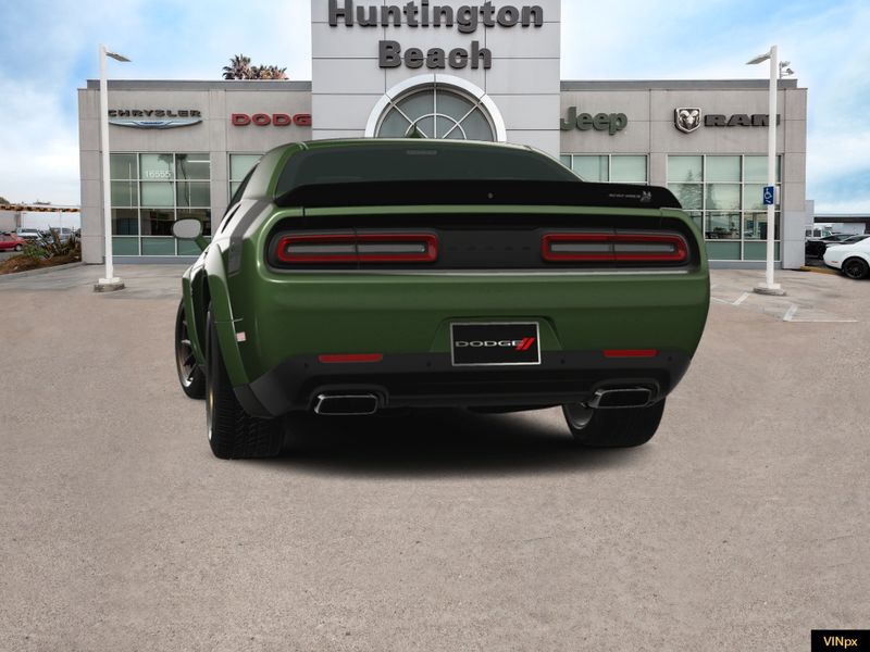2023 Dodge Challenger R/T Scat Pack Swinger Special Edition in a F8 Green exterior color and Blackinterior. BEACH BLVD OF CARS beachblvdofcars.com 
