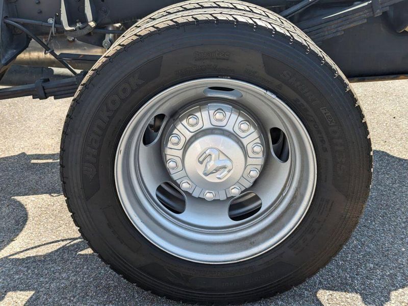 2023 RAM 5500 Chassis Tradesman in a Bright White Clear Coat exterior color and Diesel Gray/Blackinterior. Johnson Dodge 601-693-6343 pixelmotiondemo.com 