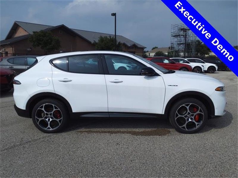 2024 Alfa Romeo Tonale Veloce in a Alfa White exterior color and Red/Blackinterior. Northside Imports Houston 281-475-4549 northsideimportshouston.com 