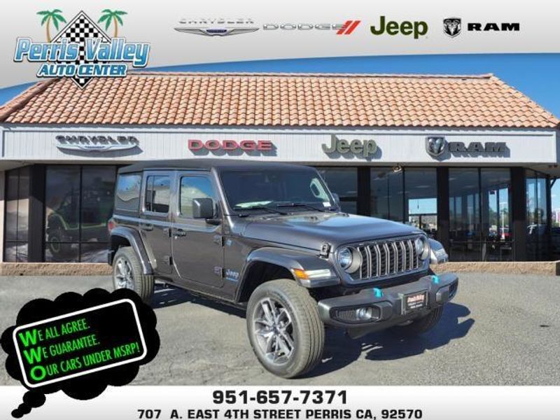 2024 Jeep Wrangler Sport S 4xe in a Granite Crystal Metallic Clear Coat exterior color and Blackinterior. Perris Valley Auto Center 951-657-6100 perrisvalleyautocenter.com 