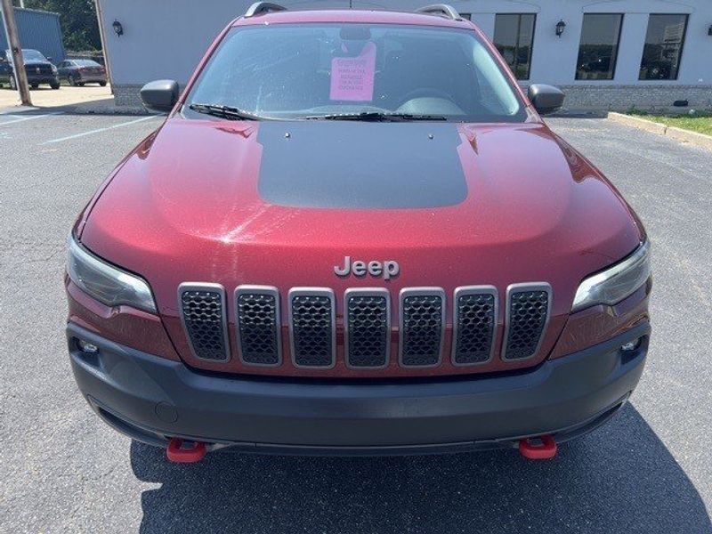 2019 Jeep Cherokee Trailhawk in a Velvet Red Pearl Coat exterior color and Blackinterior. Lakeshore CDJR Seaford 302-213-6058 lakeshorecdjr.com 