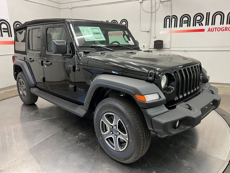 2023 Jeep Wrangler 4-door Sport S 4x4 in a Black Clear Coat exterior color and Blackinterior. Marina Chrysler Dodge Jeep RAM (855) 616-8084 marinadodgeny.com 