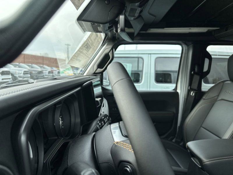 2024 Jeep Wrangler 4-door Sahara in a Silver Zynith Clear Coat exterior color and Blackinterior. Gupton Motors Inc 615-384-2886 guptonmotors.com 