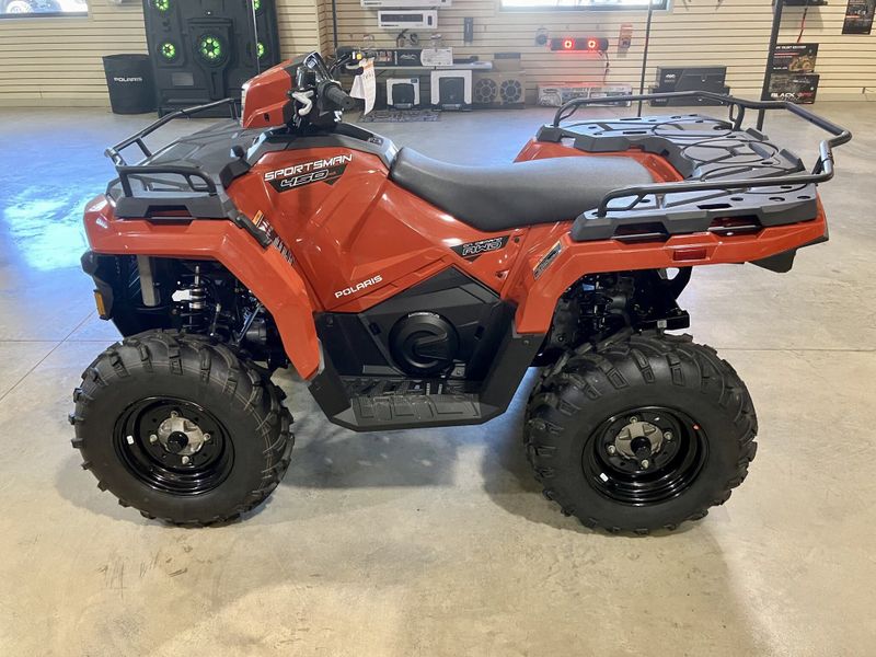 2024 Polaris Sportsman 450 H.O. EPS in a Orange exterior color. Genuine RV & Powersports (936) 569-2523 