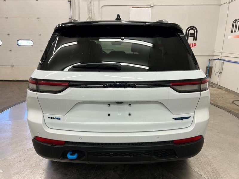 2023 Jeep Grand Cherokee Trailhawk 4xe in a Bright White Clear Coat exterior color and Global Blackinterior. Marina Chrysler Dodge Jeep RAM (855) 616-8084 marinadodgeny.com 