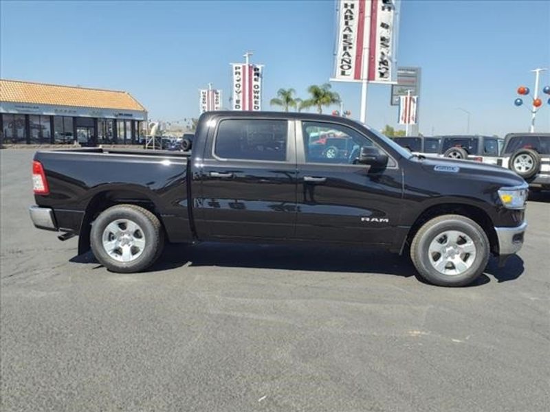 2024 RAM 1500 Big Horn Lone Star in a Diamond Black Crystal Pearl Coat exterior color and Blackinterior. Perris Valley Auto Center 951-657-6100 perrisvalleyautocenter.com 