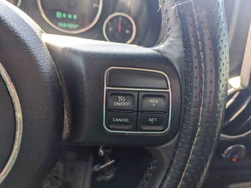 2017 Jeep Wrangler Unlimited Sahara in a Black Clear Coat exterior color and Blackinterior. Johnson Dodge 601-693-6343 pixelmotiondemo.com 