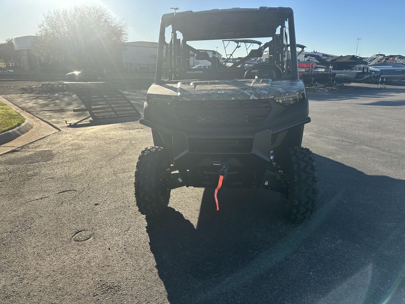 2025 POLARIS RANGER CREW 1000 PREMIUM PURSUIT CAMO in a POLARIS PURSUIT CAMO exterior color. Family PowerSports (877) 886-1997 familypowersports.com 