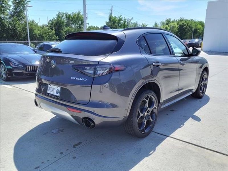 2024 Alfa Romeo Stelvio Ti in a Vesuvio Gray Metallic exterior color and Blackinterior. Northside Imports Houston 281-475-4549 northsideimportshouston.com 