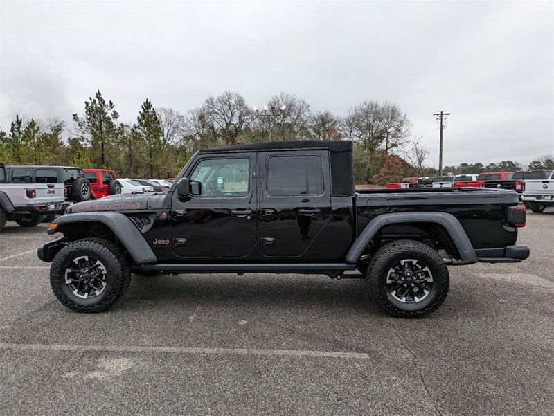 2024 Jeep Gladiator Rubicon 4x4 in a Black Clear Coat exterior color and Blackinterior. South Georgia CDJR 229-443-1466 southgeorgiacdjr.com 