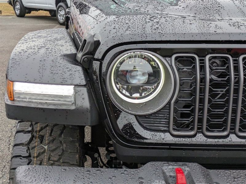 2024 Jeep Gladiator Rubicon 4x4 in a Black Clear Coat exterior color and Blackinterior. South Georgia CDJR 229-443-1466 southgeorgiacdjr.com 