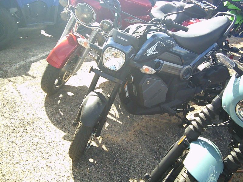 USED 2024 HONDA NAVI Image 4
