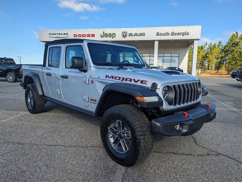 2024 Jeep Gladiator Mojave 4x4 in a Silver Zynith Clear Coat exterior color and Blackinterior. South Georgia CDJR 229-443-1466 southgeorgiacdjr.com 