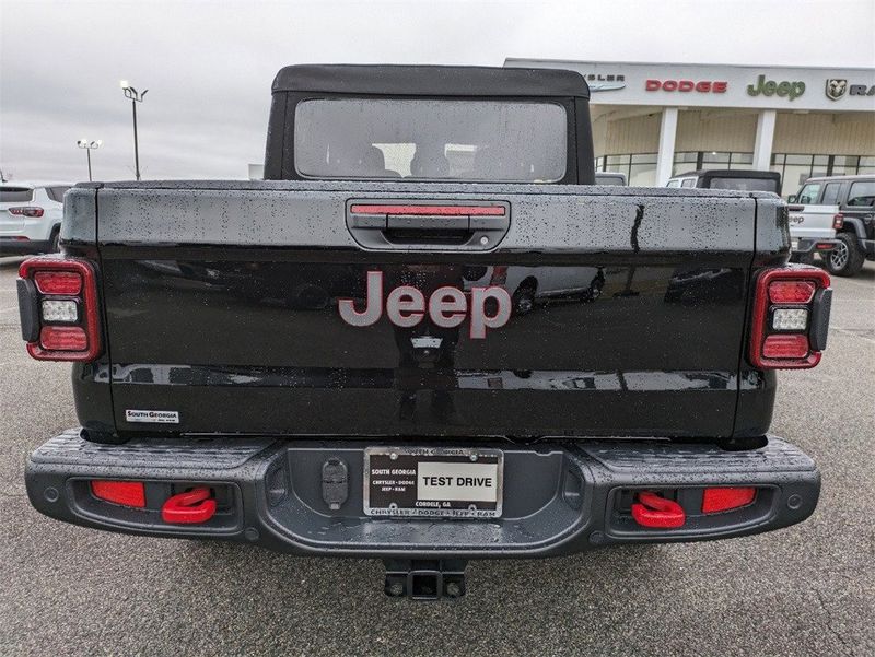 2024 Jeep Gladiator Rubicon 4x4 in a Black Clear Coat exterior color and Blackinterior. South Georgia CDJR 229-443-1466 southgeorgiacdjr.com 