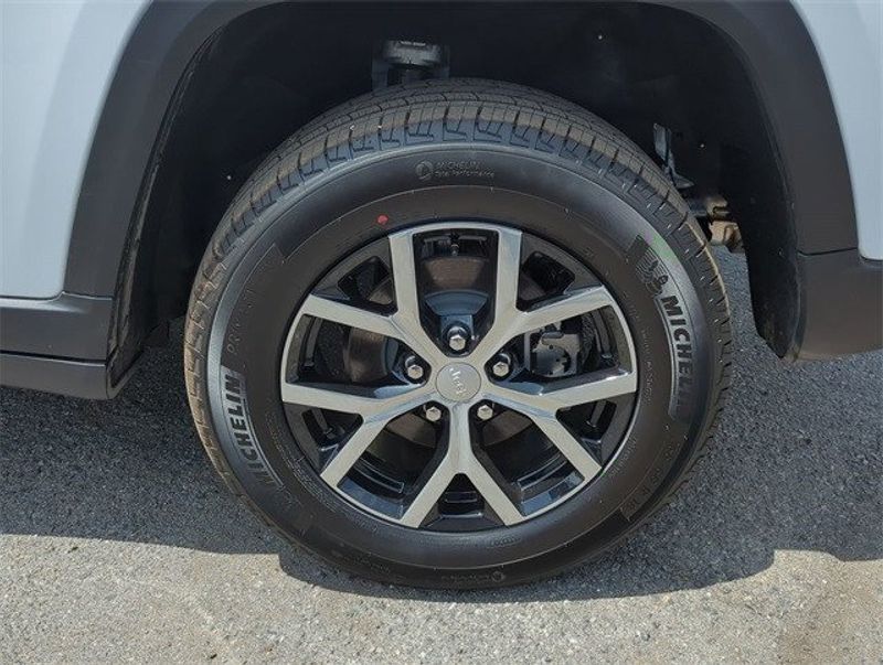 2024 Jeep Grand Cherokee Limited 4x4 in a Bright White Clear Coat exterior color. McPeek