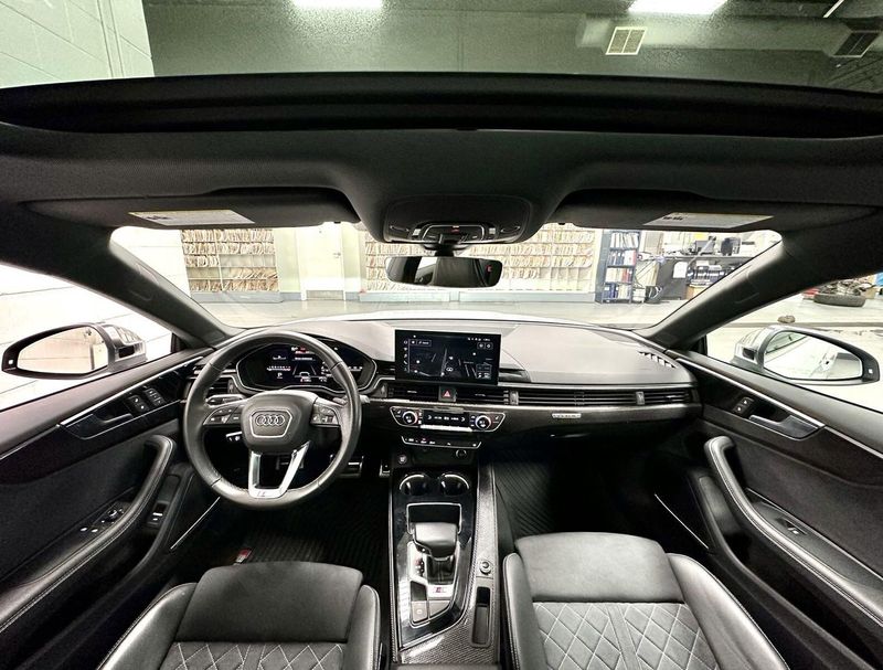 2022 Audi S5 Coupe Premium Plus AWD w/Nav in a Glacier White Metallic exterior color and Black Heated Leatherinterior. Schmelz Countryside Alfa Romeo (651) 867-3222 schmelzalfaromeo.com 