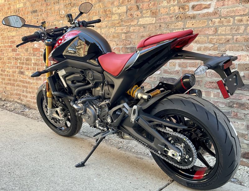 2023 Ducati Monster SP   in a red black exterior color. Motoworks Chicago 312-738-4269 motoworkschicago.com 