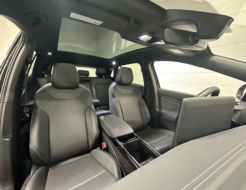 2023 Volkswagen ID.4 Pro S Plus w/Navigation in a Deep Black Pearl exterior color and Black Heated Massaging Seatsinterior. Schmelz Countryside Alfa Romeo and Fiat (651) 968-0556 schmelzfiat.com 