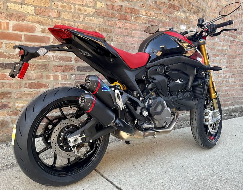 2023 Ducati Monster SP   in a red black exterior color. Motoworks Chicago 312-738-4269 motoworkschicago.com 