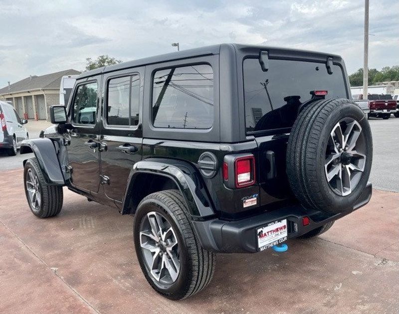 2024 Jeep Wrangler 4-door Sport S 4xe in a Black Clear Coat exterior color and Blackinterior. Matthews Chrysler Dodge Jeep Ram 918-276-8729 cyclespecialties.com 