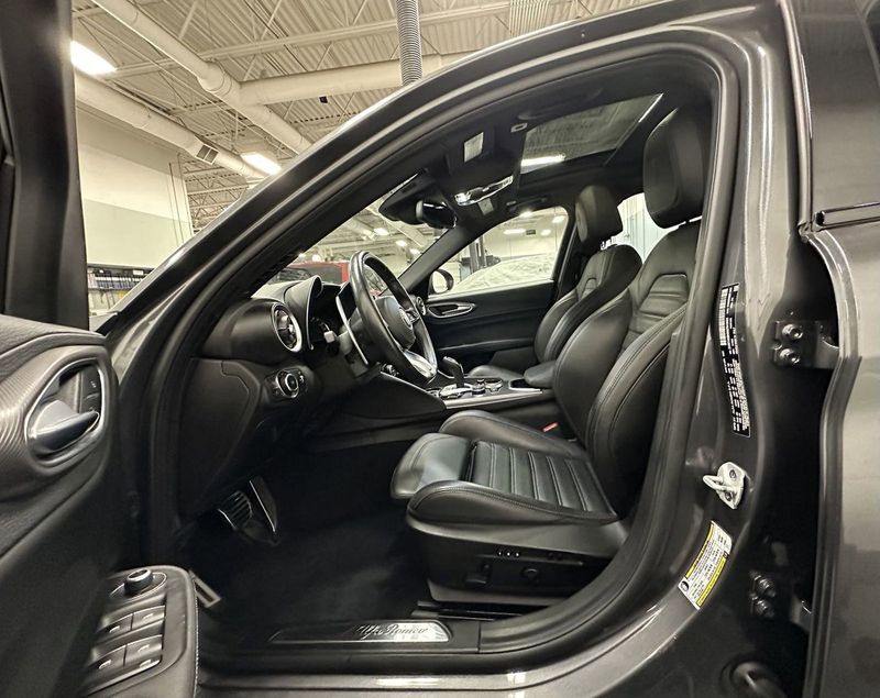 2021 Alfa Romeo Giulia Ti Sport Nero AWD w/Sunroof & Nav in a Vesuvio Gray Metallic exterior color and Black Heated Sport Leatherinterior. Schmelz Countryside SAAB (888) 558-1064 stpaulsaab.com 