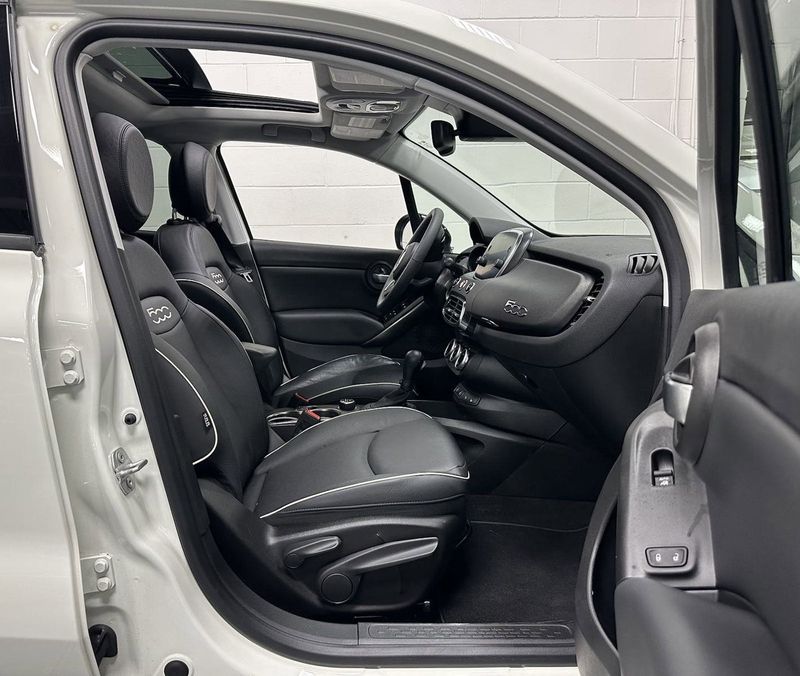 2022 Fiat 500X Trekking AWD w/Sunroof/Nav/Driver Asst in a Bianco Gelato (White Clear Coat) exterior color and Black Heated Leatherinterior. Schmelz Countryside SAAB (888) 558-1064 stpaulsaab.com 