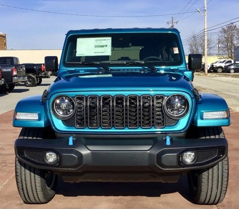 2024 Jeep Wrangler 4-door Sport S 4xe in a Bikini Pearl Coat exterior color and Blackinterior. Matthews Chrysler Dodge Jeep Ram 918-276-8729 cyclespecialties.com 