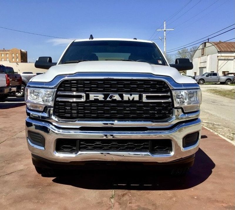 2022 RAM 2500 Big Horn in a Bright White Clear Coat exterior color and Blackinterior. Matthews Chrysler Dodge Jeep Ram 918-276-8729 cyclespecialties.com 