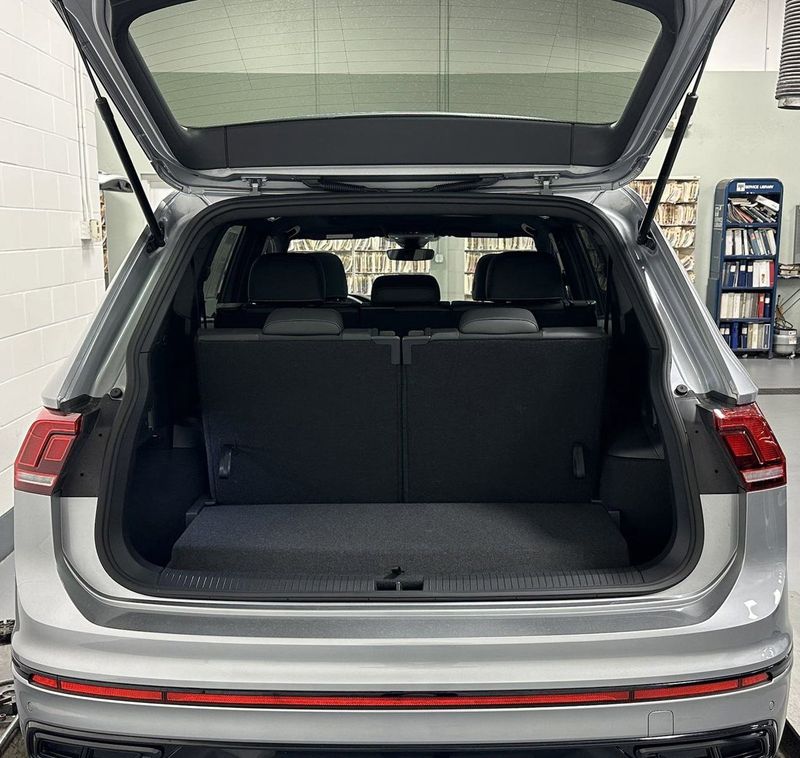 2023 Volkswagen Tiguan SE R-Line Black w/Sunroof in a Pyrite Silver Metallic exterior color and Black Heated Seatsinterior. Schmelz Countryside Alfa Romeo (651) 867-3222 schmelzalfaromeo.com 