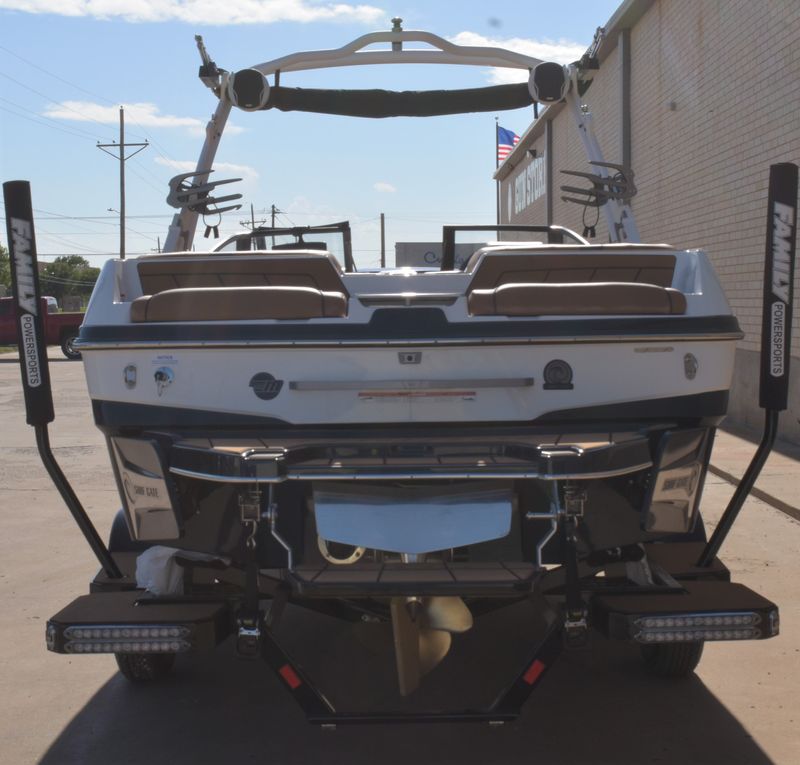 2023 MALIBU 23 LSV  in a ARCTIC WHITE/ZEPHYR BLU exterior color. Family PowerSports (877) 886-1997 familypowersports.com 