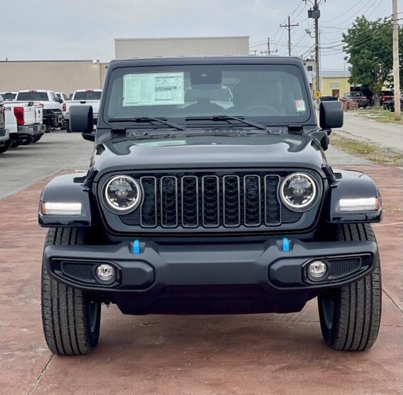 2024 Jeep Wrangler 4-door Sport S 4xe in a Black Clear Coat exterior color and Blackinterior. Matthews Chrysler Dodge Jeep Ram 918-276-8729 cyclespecialties.com 