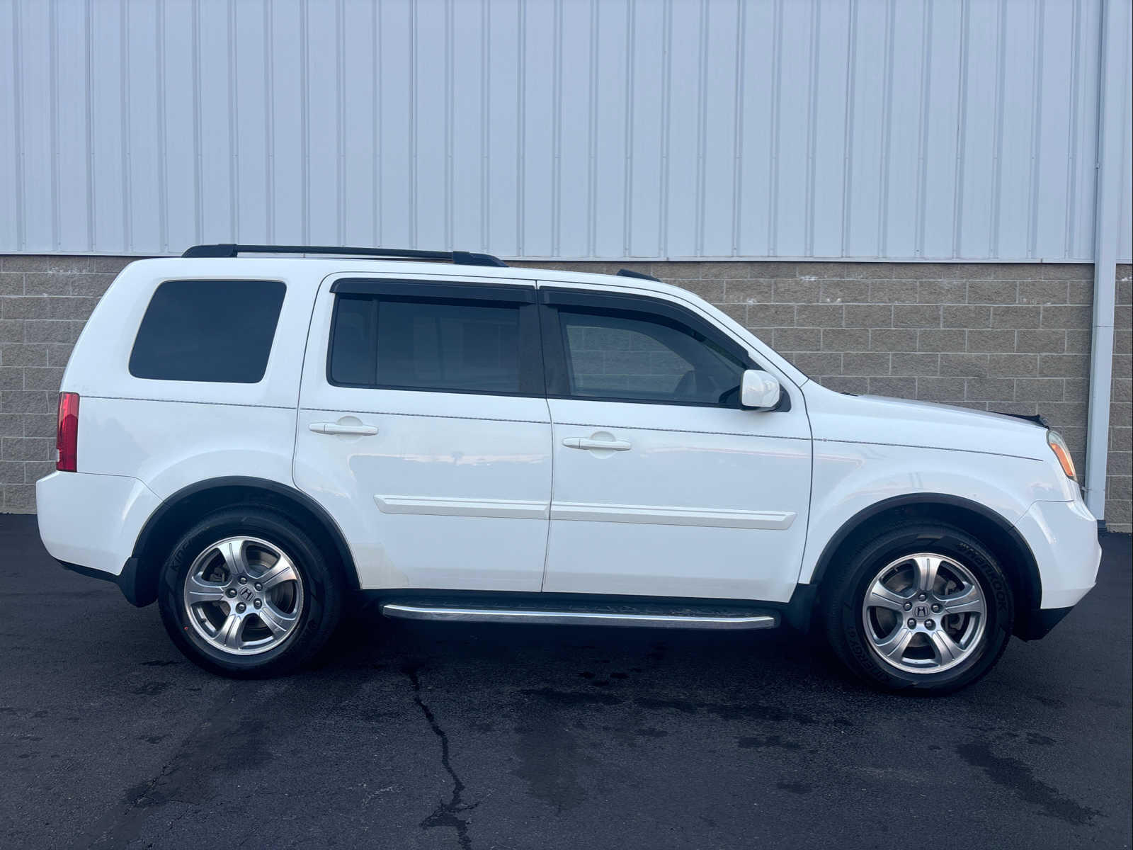 Used 2015 Honda Pilot EX-L with VIN 5FNYF3H69FB031687 for sale in Wilmington, OH