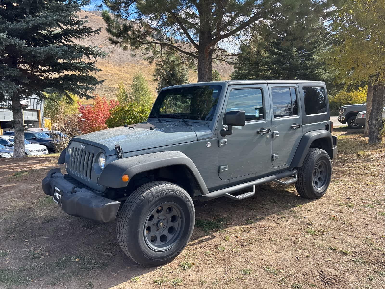 Used 2015 Jeep Wrangler Unlimited Sport with VIN 1C4BJWDG9FL683615 for sale in Jackson, WY