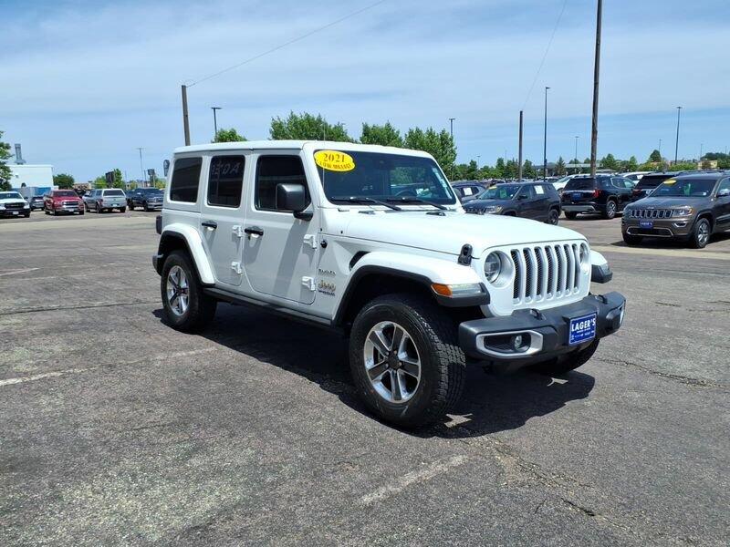 Used 2021 Jeep Wrangler Unlimited Sahara with VIN 1C4HJXEN9MW706335 for sale in Mankato, Minnesota