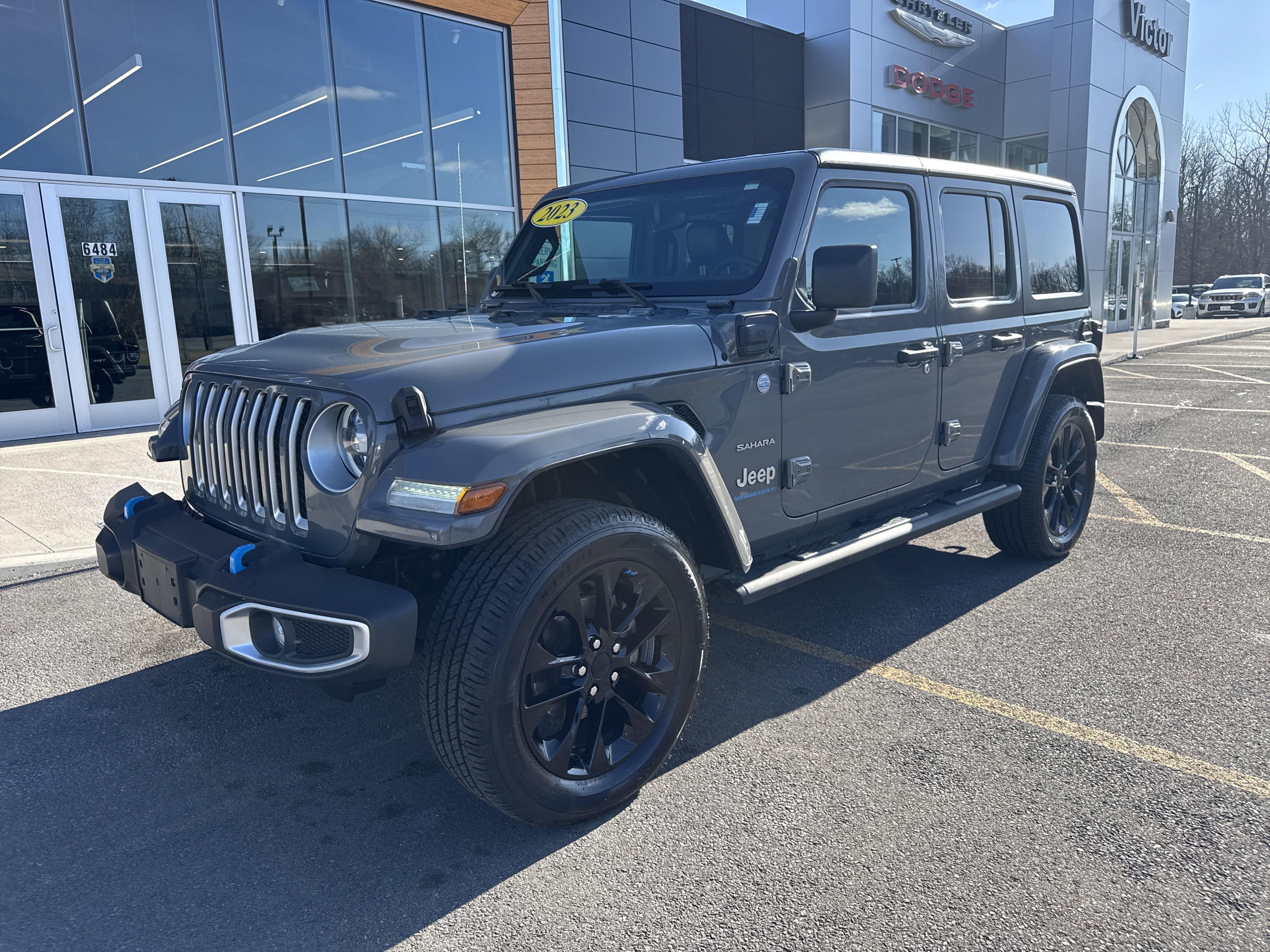 Used 2023 Jeep Wrangler 4xe Sahara 4XE with VIN 1C4JJXP63PW641607 for sale in Victor, NY