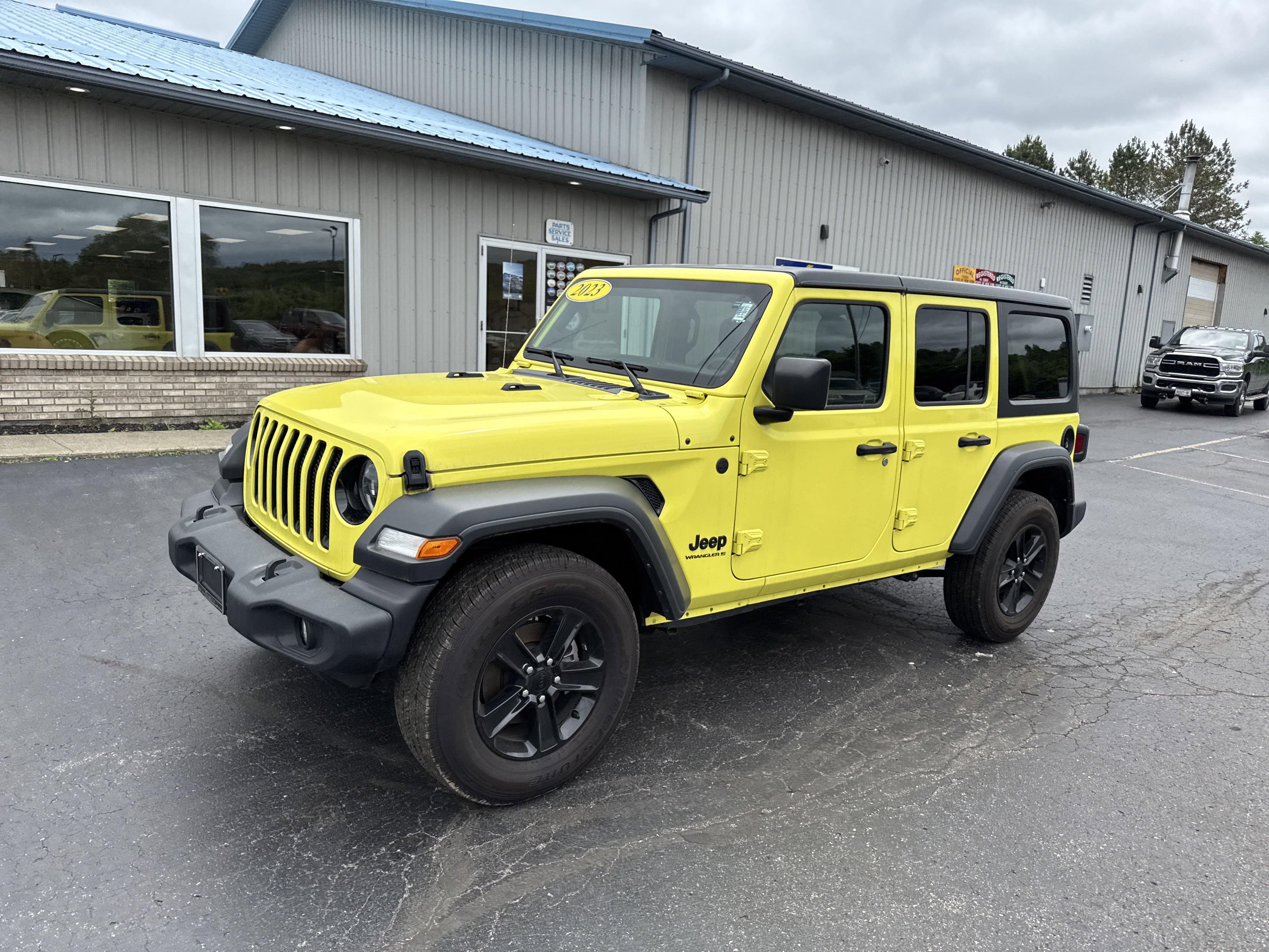 Used 2023 Jeep Wrangler 4-Door Altitude with VIN 1C4HJXDG6PW658607 for sale in Victor, NY