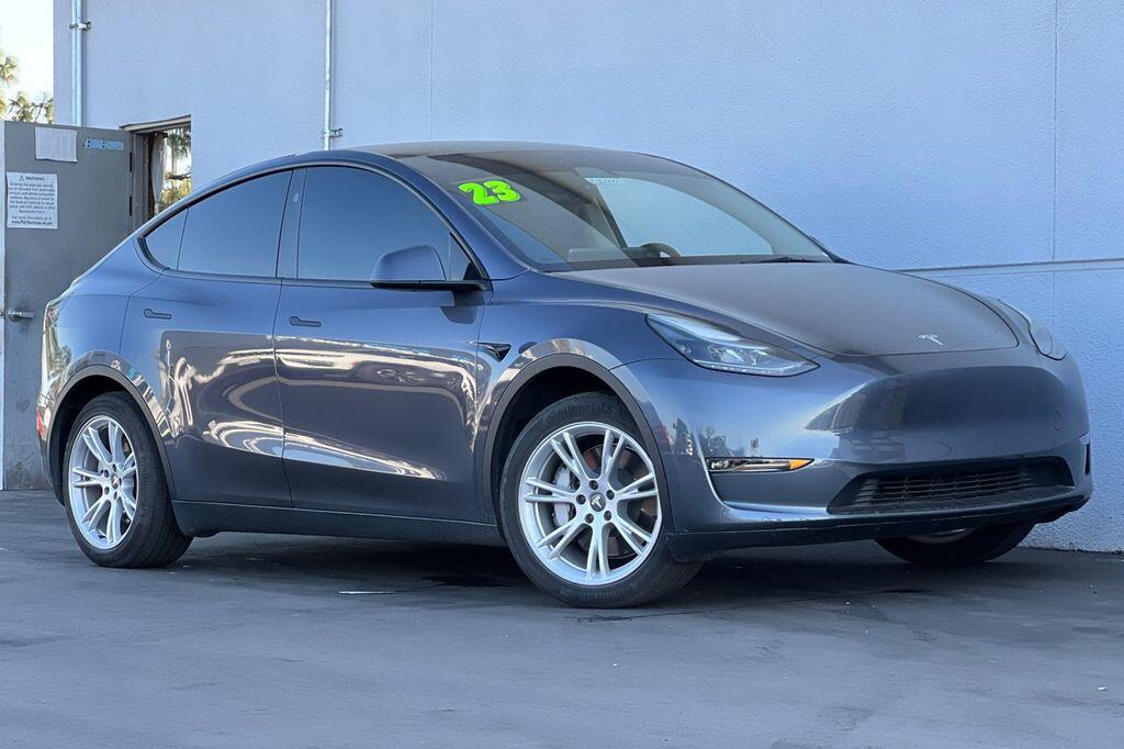 Used 2023 Tesla Model Y Base with VIN 7SAYGDED1PF961142 for sale in Clovis, CA