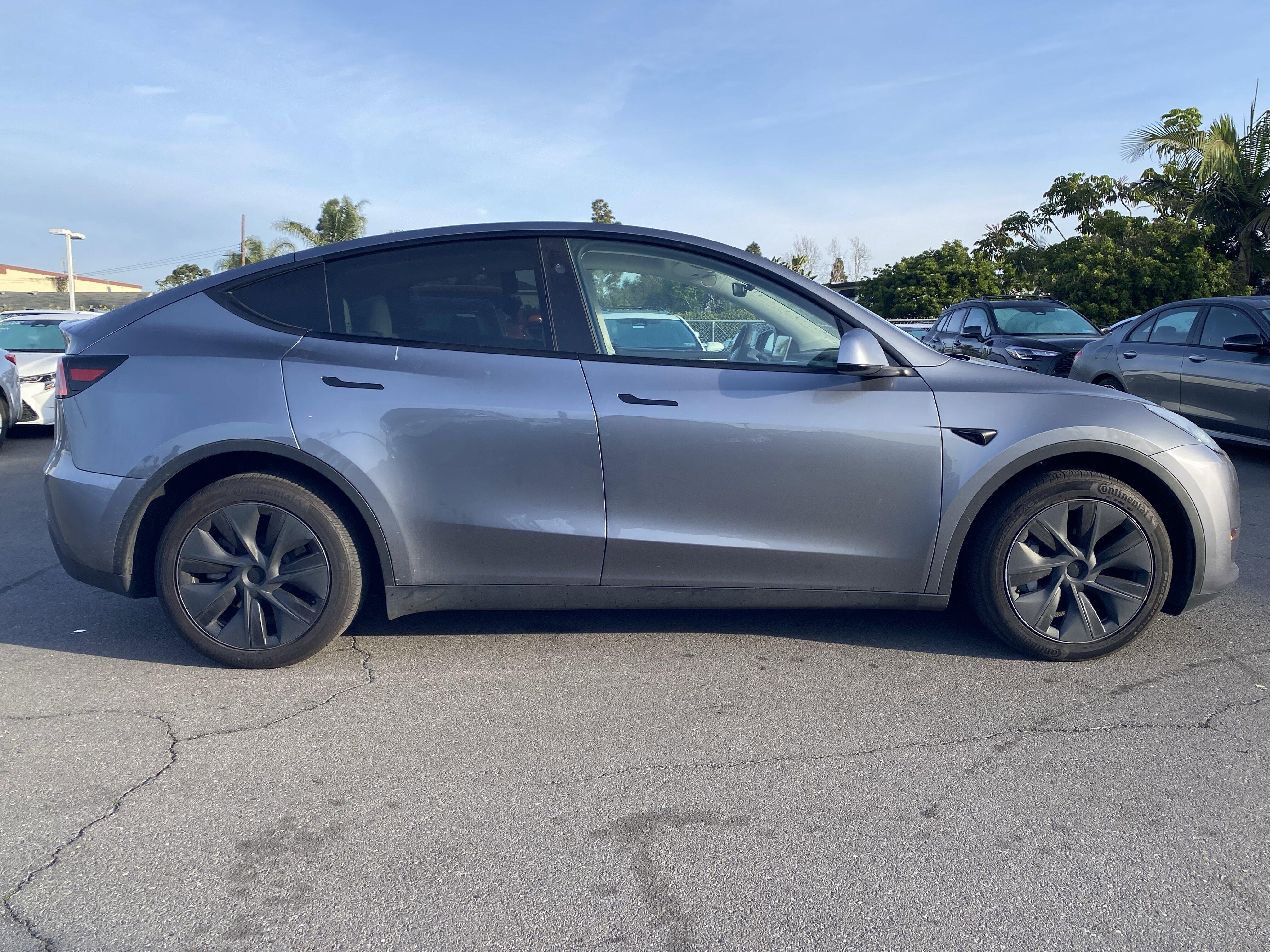 Used 2024 Tesla Model Y Long Range with VIN 7SAYGDEE6RF206323 for sale in Northfield, Minnesota