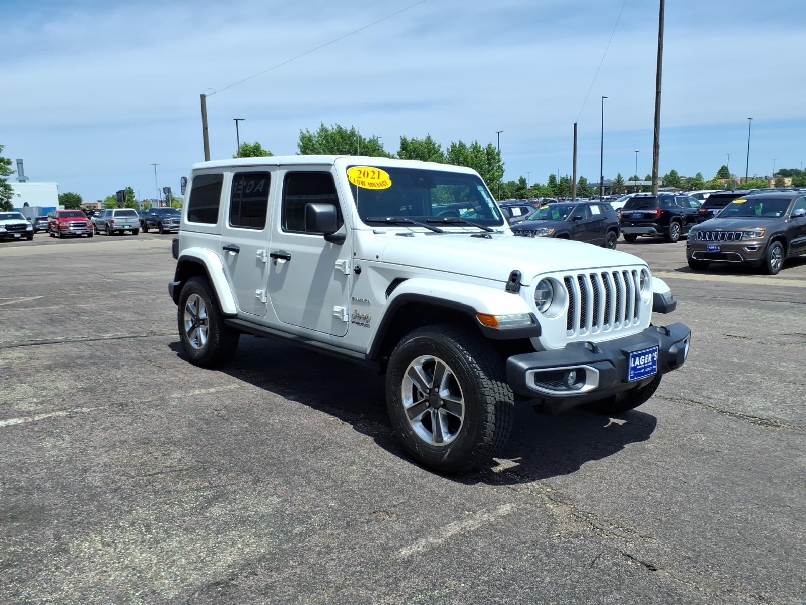 Used 2021 Jeep Wrangler Unlimited Sahara with VIN 1C4HJXEN9MW706335 for sale in Mankato, Minnesota