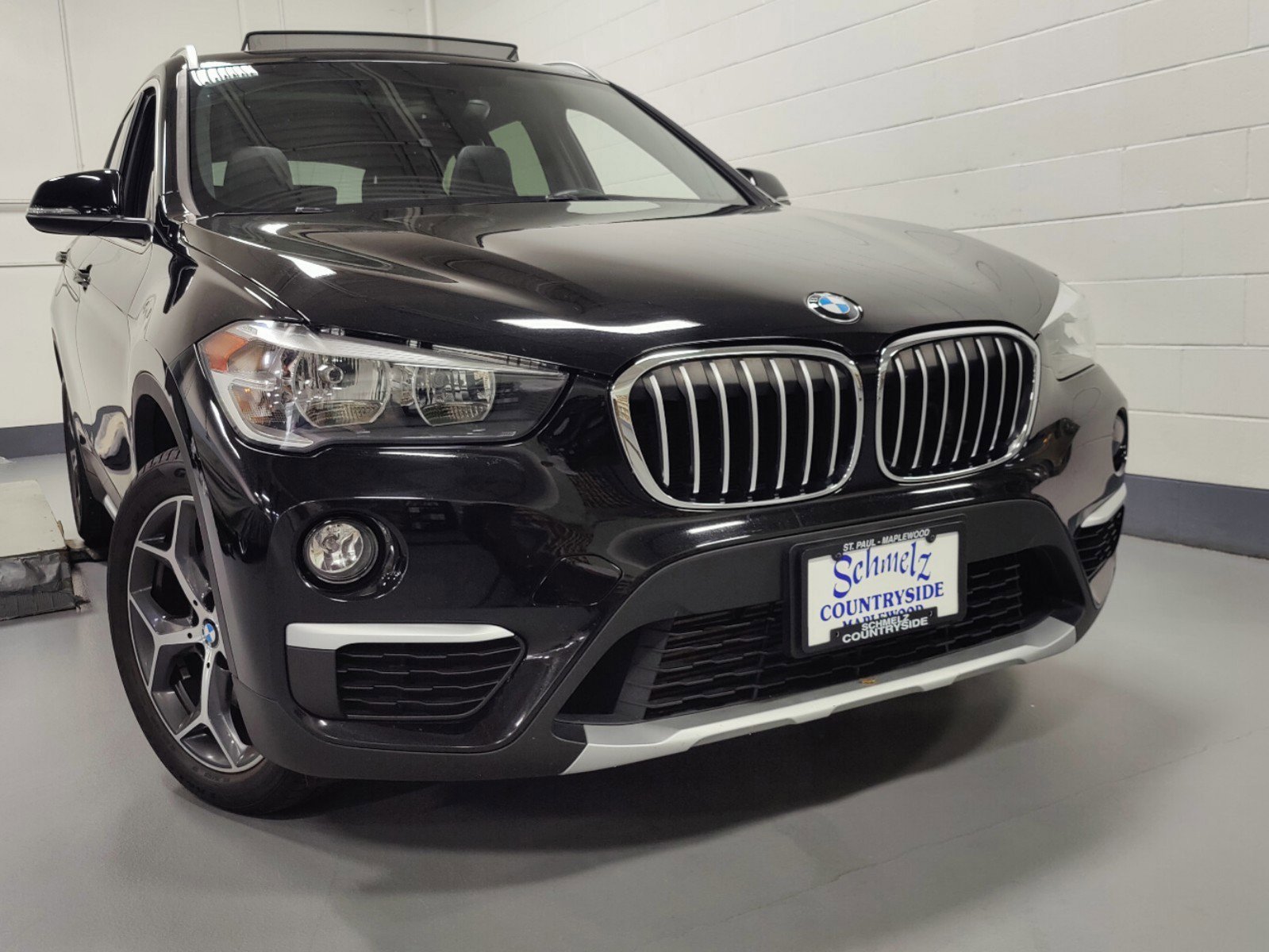 Used 2018 BMW X1 28i with VIN WBXHT3C39J3H29945 for sale in Maplewood, MN