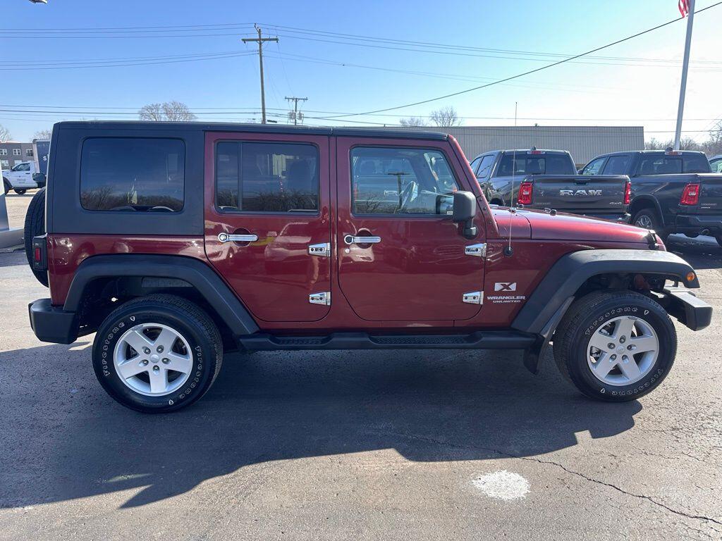 Used 2009 Jeep Wrangler Unlimited X with VIN 1J4GA39179L761199 for sale in Angola, IN